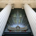 Exterior detail of the Temple Room's west window, featuring the 33°, Scottish Rite double-headed eagle